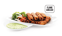 Seekh Kabab (Ground chicken meat, shaped and flame grilled on skewers)